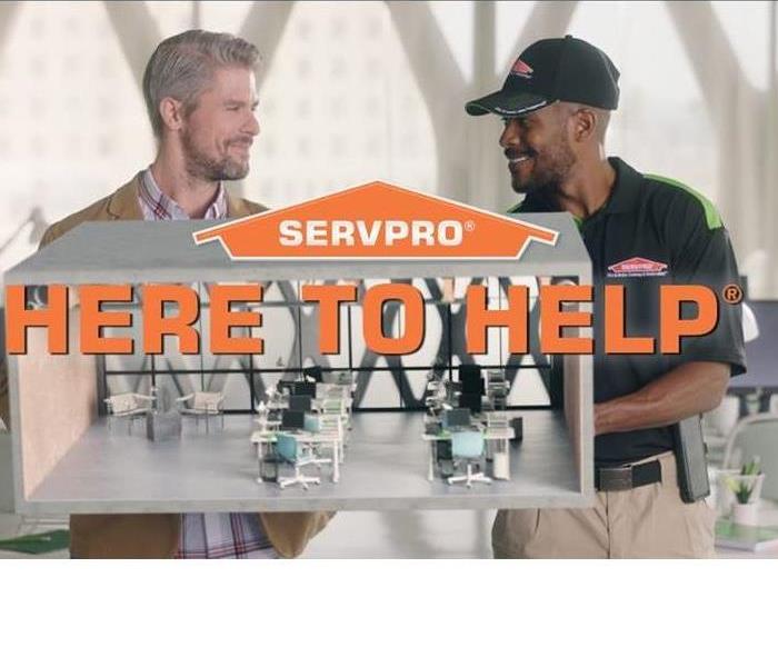 SERVPRO specialist discussing the customer's cleaning needs.
